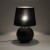 Lampka SANTANA 16047 TK-Lighting to czarny akcent do salonu lub sypialni. Wymienna żarówka E27 pozwala dobrać jasność i barwę światła. Max 15W LED, wymiary 39 × 39 × 60 cm, włącznik i IP20. Źródło światła do kupienia osobno.