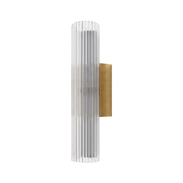 Złoty kinkiet TRIVIA GOLD Milagro ML2723 z ryflowanym kloszem z akrylu. LED 6 W, CCT 2700/3000/4000 K, IP44. Klosz 30 cm, średnica 6 cm. Do łazienki przy lustrze, sypialni i salonu. Bez funkcji ściemniania.