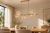 Beżowa lampa nad stół LAVA Sabia 11109 TK-Lighting z siedmioma szklanymi kloszami w kolorze koniaku. Do jadalni, salonu i kuchni. Wymiary 33x90x156 cm, 7xG9 LED max 8 W na żarówkę. Żarówki kupisz osobno. naszelampy24.pl. AI