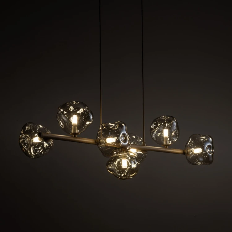 LAVA Sabia 11109 TK-Lighting to lampa wisząca w stylu glamour. Siedem kloszy z koniakowego szkła zdobi beżową oprawę. Nad stół do jadalni lub barek w kuchni. 7xG9, max 8 W LED na żarówkę, IP20, 230 V. naszelampy24.pl. AI