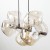 Lampa sufitowa wisząca LAVA Brown 11033 TK-Lighting: brązowa konstrukcja, siedem falowanych kloszy ze szkła i oprawki G9. Do salonu, jadalni oraz kuchni. Szerokość 90 cm, IP20. Gwarancja producenta: 2 lata.
