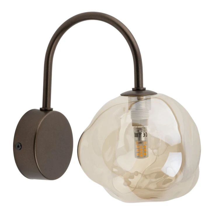 Brązowy kinkiet LAVA 11024 TK-Lighting z koniakowym kloszem podkreśli przytulny charakter wnętrza. Wymienna żarówka G9 LED do 8 W umożliwia wybór jasności i barwy światła. Model do salonu, sypialni i korytarza. IP20, gwarancja 2 lata.