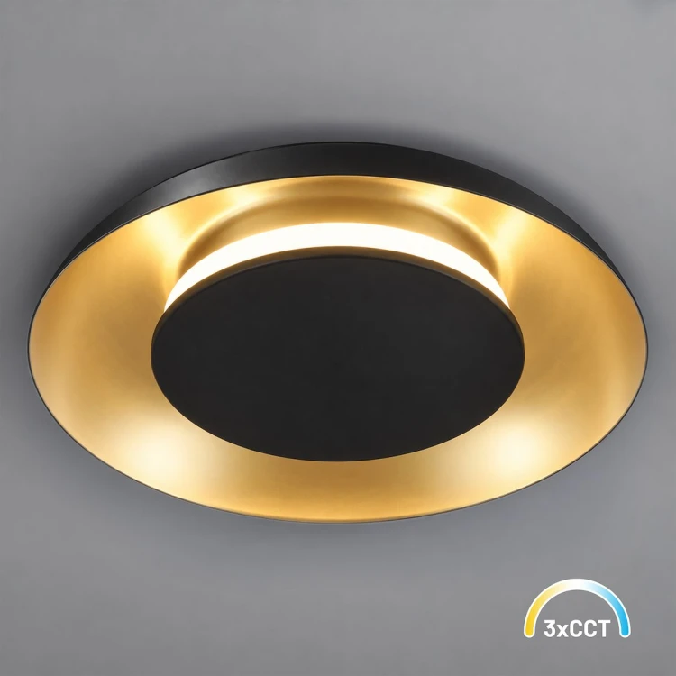 Plafon LED PIATTINO ML2940 może pełnić także funkcję kinkietu. Metalowo-akrylowa oprawa w kolorze czarno-złotym pasuje do holu, salonu i sypialni. Moc 15W, CCT 3000/4000/6000K, średnica 25 cm, wysokość 4 cm, IP20.