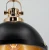 Oświetl jadalnię lampą LENTO Elem 7899/1 BL TR. Czarny metalowy klosz, złote wnętrze i ozdobne zawieszenie tworzą loftową kompozycję. Szerokość 31 cm, regulacja wysokości 31–88 cm i oprawka E27
