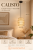 CALISTO TK-Lighting 5401 to niewielka lampa wisząca boho z dekoracyjnym abażurem z juty. Pasuje do salonu, sypialni i jadalni. Czarne zawieszenie, średnica 20 cm, wysokość 150 cm. Źródło światła E27, IP20.