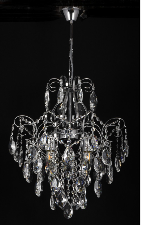 Żyrandol kryształowy SONIA chrom 4x60W marki Venti to elegancka lampa sufitowa z metalową konstrukcją i przezroczystymi kryształami. Średnica 45 cm i 4 źródła światła E27 sprawiają, że idealnie ozdobi i rozświetli salon, jadalnię czy sypialnię