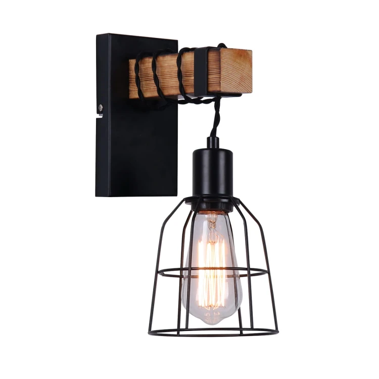 Kinkiet PONTE Italux WL-4290-1-L łączy czarny metal z brązowym drewnem. Klatkowy klosz eksponuje żarówkę E27 i podkreśla styl loftowy. Lampa o wysokości 32 cm sprawdzi się w salonie, sypialni, korytarzu lub gabinecie.