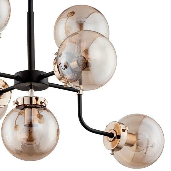 Lampa sufitowa TRANSFORMERS 7x40W czarna LOFT złota kule Alfa 24857 to designerskie oświetlenie z 7 źródłami światła E14. Połączenie czerni, złota i beżowych szklanych kul tworzy efektowny akcent do salonu, jadalni i wnętrz w stylu loft