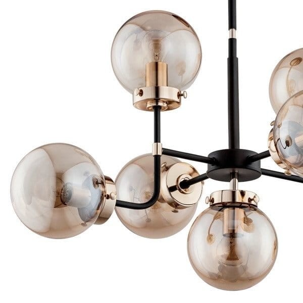 Lampa sufitowa TRANSFORMERS 7x40W czarna LOFT złota kule Alfa 24857 to designerskie oświetlenie z 7 źródłami światła E14. Połączenie czerni, złota i beżowych szklanych kul tworzy efektowny akcent do salonu, jadalni i wnętrz w stylu loft