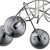 Nowoczesna lampa sufitowa TANGO 5xE14 w kolorze chrom z dymionymi szklanymi kloszami, zamontowana na suficie w jasnym, stylowym wnętrzu. Elegancki design, idealny do salonu lub jadalni, doskonale komponuje się z nowoczesnym wystrojem