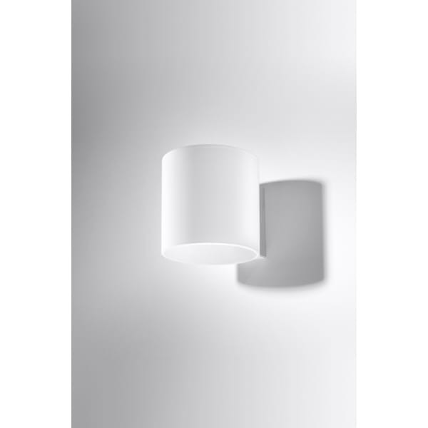 Nowoczesny kinkiet VICI SL.0211 z białego matowego szkła to elegancka lampa ścienna o cylindrycznym kształcie. Świeci w górę i w dół, tworząc subtelne, nastrojowe oświetlenie. Idealna do salonu, sypialni, korytarza i nowoczesnych wnętrz