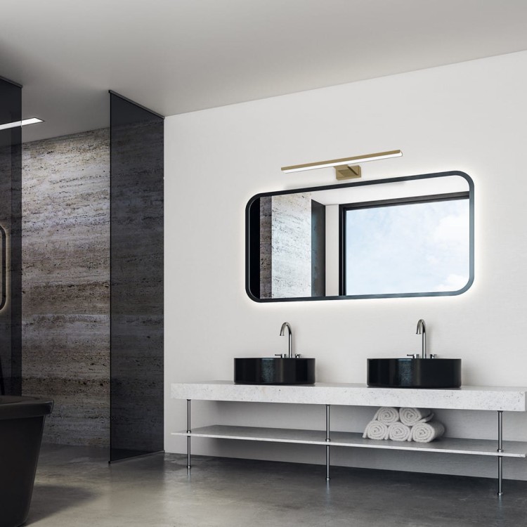 Minimalistyczny kinkiet SHINE BRASS LED Milagro — smukła forma, ciepły odcień mosiądzu, 4000K, IP44. Idealny do łazienki, garderoby i hoteli. Energooszczędne LED i nowoczesny design.