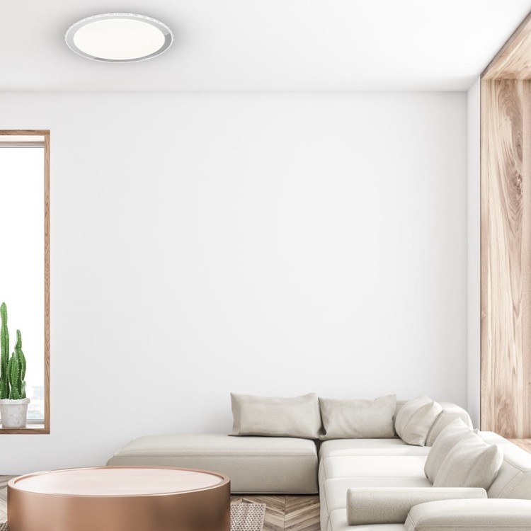 LAYLA 33W LED to designerski plafon z białą obudową i subtelnym efektem gwiezdnego pyłu. Zmiana barwy i ściemnianie pilotem zapewniają komfort. Średnica 40 cm, neutralny styl, idealny do eleganckich i nowoczesnych wnętrz.