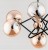 Lampa VIRGINIA 6xE14 Alfa to złoto-miedziany żyrandol z sześcioma bursztynowymi kloszami. Solidne wykonanie z metalu i szkła, o wymiarach 65 cm szerokości i 50 cm wysokości. Idealne oświetlenie w stylu glamour do salonu, jadalni i sypialni.