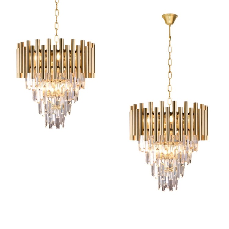 Żyrandol MADISON ML5992 Milagro to połączenie złotego metalu i błyszczących kryształów. 9 punktów E14 i regulacja wysokości czynią go idealnym do reprezentacyjnych wnętrz.