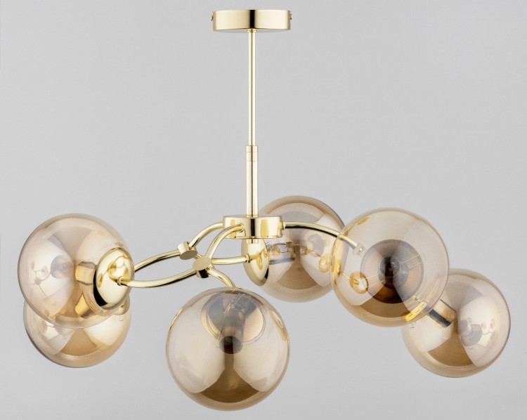 AVANTI Alfa 6xE14 to designerska lampa sufitowa z bursztynowymi kulami. Złote wykończenie i 6 punktów światła zapewniają elegancję oraz dobre oświetlenie większych pomieszczeń.