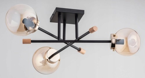 Nowoczesna lampa sufitowa 3xE14 z bursztynowymi kulami to stylowe oświetlenie do domu. Czarna konstrukcja i ciepły efekt światła tworzą wyjątkowy klimat w salonie, jadalni i przedpokoju