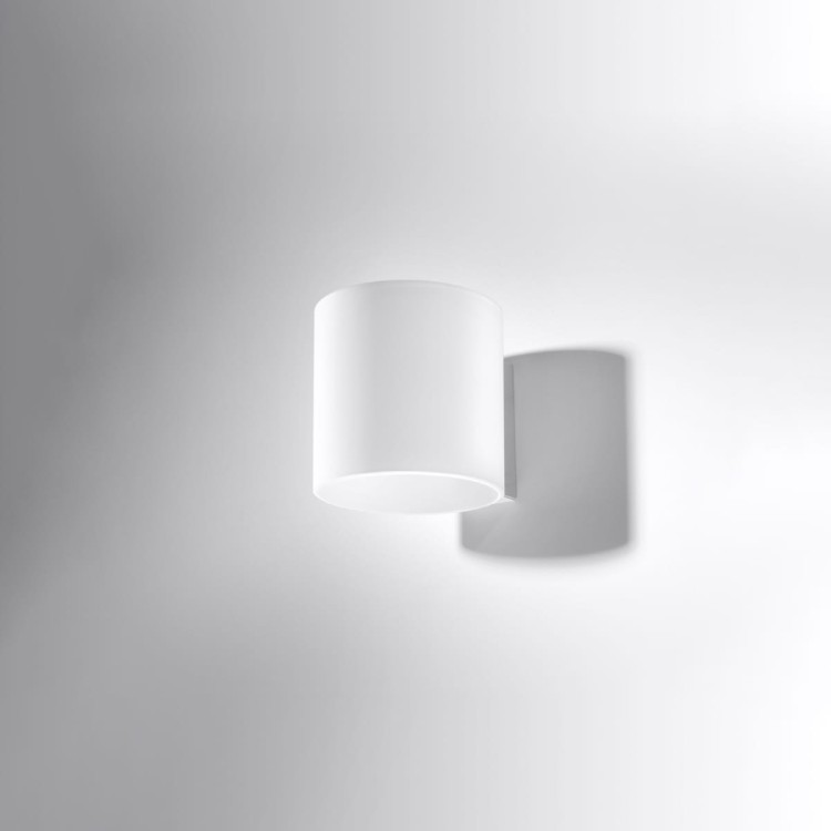 Nowoczesny kinkiet VICI SL.0211 z białego matowego szkła to elegancka lampa ścienna o cylindrycznym kształcie. Świeci w górę i w dół, tworząc subtelne, nastrojowe oświetlenie. Idealna do salonu, sypialni, korytarza i nowoczesnych wnętrz