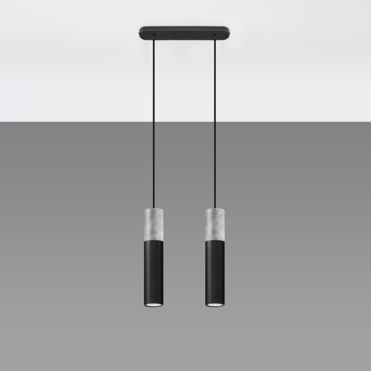 Betonowa lampa wisząca BORGIO tuba to nowoczesne oświetlenie w loftowym stylu. Połączenie szarości betonu i czerni stali podkreśla industrialny charakter wnętrza. Lampa 2xGU10 z regulacją zawiesia, idealna nad stół do jadalni, salonu, kuchni czy sypialni