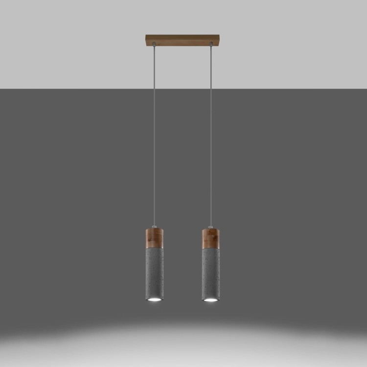 Nowoczesna lampa wisząca ZANE – betonowa tuba z detalem z naturalnego drewna. Minimalistyczny design do kuchni, jadalni i salonu. Wymienne źródło GU10 (max 40W) pozwala dobrać barwę i moc. Regulowana wysokość do 120 cm. IP20. Polska produkcja.
