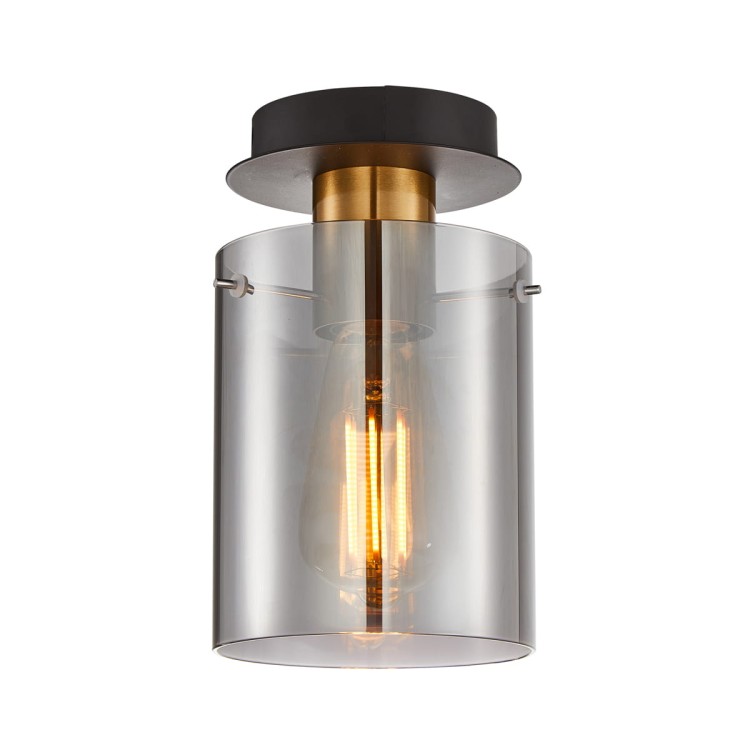Plafon SARDO Italux SPL-5581-1SC-BRO-SG to nowoczesna lampa sufitowa z dymionym kloszem i wykończeniem w kolorze antycznego brązu. Minimalistyczny design doskonale sprawdzi się w loftowych i eleganckich wnętrzach.