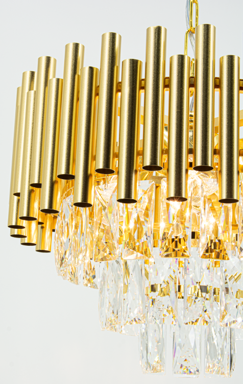 Żyrandol BARI 4xE27 złoty Glamour 6230/4 TR to elegancka lampa sufitowa z metalu i kryształu. Złoty kolor i przezroczyste kryształy tworzą luksusowy efekt świetlny. Idealny do salonu, sypialni i jadalni. Średnica 39 cm, wysokość całkowita 78 cm