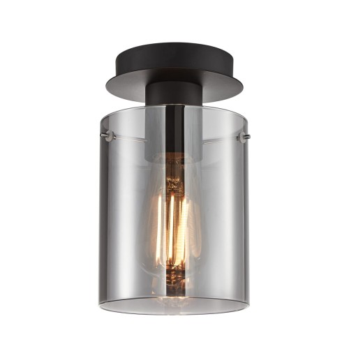 Plafon SARDO Italux SPL-5581-1SC-BK-SG to nowoczesna lampa sufitowa z dymionym kloszem i czarną matową konstrukcją. Minimalistyczny design idealnie pasuje do wnętrz loftowych, industrialnych oraz nowoczesnych.