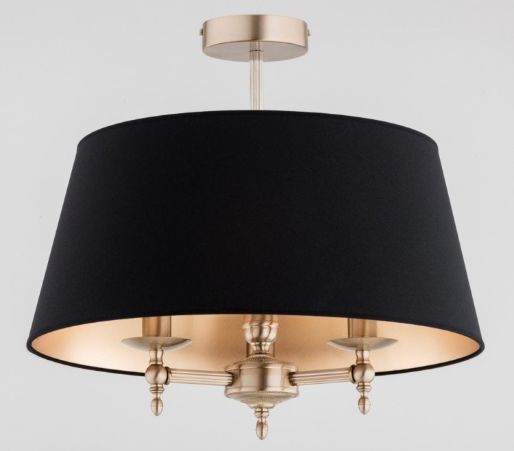 Lampa sufitowa ROKSANA MIX Alfa 62482 to eleganckie oświetlenie z czarnym abażurem ze złotym wnętrzem i patynowaną armaturą. Wykonana z metalu i tkaniny, średnica 50 cm, wysokość 46 cm. Źródło światła 3xE14, IP20, 230V. Idealna do salonu i jadalni.