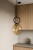 Lampa sufitowa LISTER pojedyncza wisząca w kolorze czarnym, kula bursztynowa. Polska produkcja.