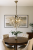 Żyrandol kryształowy RAMONA 4x60W patyna Venti to elegancka lampa sufitowa z metalu i szkła. Ozdobiona kryształami pięknie rozprasza światło. Średnica 46 cm, wysokość 74 cm. Oprawki 4xE27 do 60W, kompatybilna z LED. Idealna do salonu, jadalni i sypialni