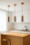 Nowoczesna lampa wisząca ZANE – betonowa tuba z detalem z naturalnego drewna. Minimalistyczny design do kuchni, jadalni i salonu. Wymienne źródło GU10 (max 40W) pozwala dobrać barwę i moc. Regulowana wysokość do 120 cm. IP20. Polska produkcja.