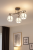 Lampa sufitowa SONIA Venti W-A2435/3 chrom z trzema białymi kloszami zdobionymi chromowanymi paskami. Styl nowoczesny, wykonanie metal i szkło. Wymiary: szerokość 52 cm, wysokość 28 cm. Źródło światła 3x E27 60W (możliwość LED