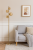 Lampa podłogowa CANELLO Italux 4xG9 w kolorze mosiądzu miodowego z bursztynowymi kulami. Elegancka oprawa o wysokości 160 cm i szerokości 31 cm, idealna do salonu, sypialni czy gabinetu. Solidne wykonanie z metalu i szkła, gwarancja 2 lata
