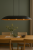 Lampa wisząca GONDOLA 3xE27 Sigma to połączenie czerni i miedzi w nowoczesnym wydaniu. Duży klosz 114 cm świetnie prezentuje się nad stołem w jadalni, nadając wnętrzu eleganckiego i przytulnego klimatu.