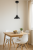 Stylowa lampa Lemir ASTRO O2981 W1 CZA + BIA, minimalistyczny zwis z matowym czarnym kloszem i białym odbłyśnikiem, nowoczesny design.