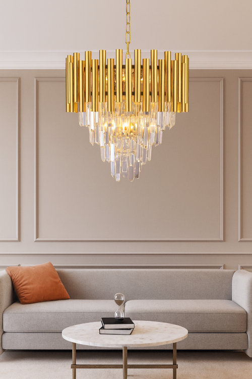 Żyrandol MADISON ML5992 Milagro to elegancka złota lampa glamour z kryształkami. 9 źródeł E14 zapewnia efektowne oświetlenie, a stylowy design idealnie podkreśli wystrój salonu, jadalni lub sypialni.