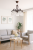 Lampa sufitowa GRACJA 5xE27 Alfa 20895 to elegancka oprawa w klasycznym stylu, wykonana z drewna, stali i szkła. Brązowa konstrukcja i białe klosze idealnie pasują do salonu, jadalni i sypialni, tworząc ciepły klimat.
