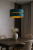 Lampa DUO to elegancka oprawa oświetleniowa w kolorze turkusowym ze złotym wnętrzem. Idealna do salonu, jadalni i sypialni. Klosz Ø 40 cm, wysokość 22 cm, zwis 100 cm. Gniazdo E27, polska produkcja, nowoczesny design i wyjątkowy klimat w każdym wnętrzu.