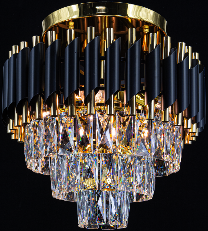 Stylowy plafon TOLEDO 4xE27 glamour to czarny i złoty żyrandol z kryształowymi detalami. Doskonały do nowoczesnych aranżacji wnętrz, zapewnia eleganckie i nastrojowe oświetlenie.