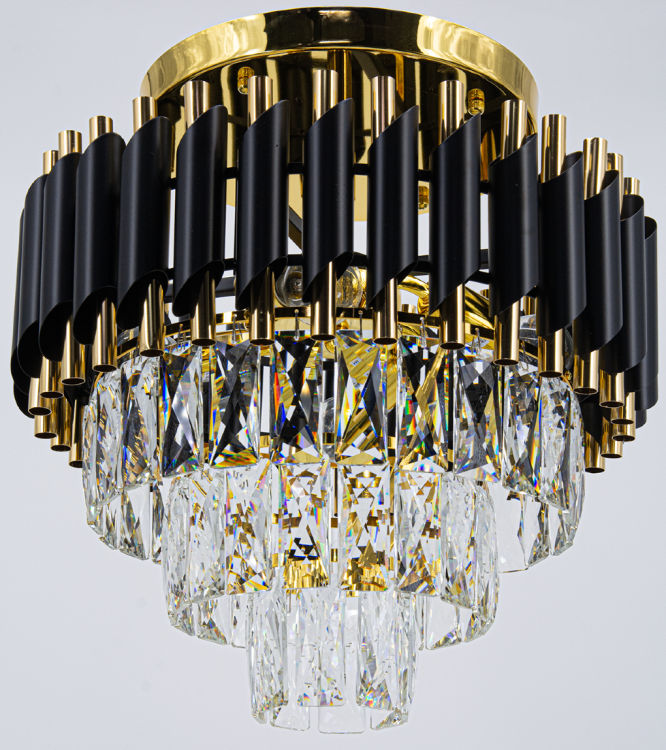 Lampa glamour TOLEDO 4xE27 łączy złoto, czerń i kryształ, tworząc ekskluzywną dekorację wnętrz. Idealna do salonów, sypialni i eleganckich przestrzeni. Luksus i blask w każdym detalu.