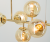 Nowoczesna złota lampa PACO z sześcioma bursztynowymi kloszami, idealna do jadalni i salonu. Ciepłe światło i elegancki design podkreślą styl każdego wnętrza. Idealna do oświetlenia stołu i kuchni, wysoka jakość wykonania.