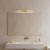 KLIMT 60 cm to nowoczesny kinkiet łazienkowy IP44 w złotym kolorze, idealny nad lustro. Oferuje regulację światła 3000–6000K, moc 12W LED i 1320 lm. Doskonały do codziennych czynności i stylowych wnętrz.