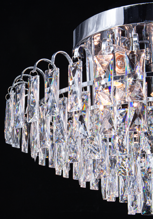 Lampa sufitowa MONACO w chromie z sześcioma źródłami E27 zapewnia mocne, efektowne światło. Idealna do wnętrz glamour i przestrzeni reprezentacyjnych.