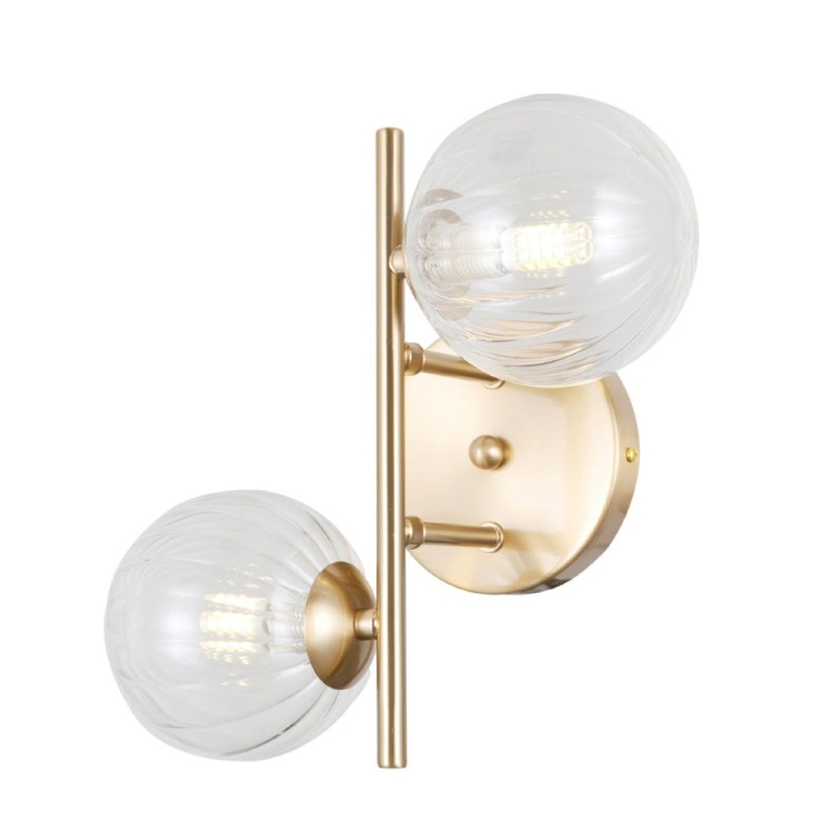 Kinkiet TOLEDO 2xG9 złoty Kule Italux to połączenie elegancji i nowoczesności. Transparentne szklane klosze i złota oprawa podkreślają styl glamour każdego wnętrza.