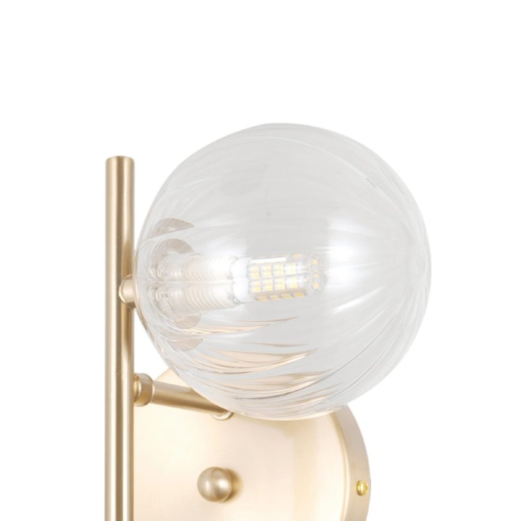 Lampa ścienna TOLEDO 2xG9 w kolorze złotym z kulistymi kloszami to dekoracyjne i funkcjonalne oświetlenie do salonu i sypialni. Wnosi ciepło, styl i elegancki akcent.