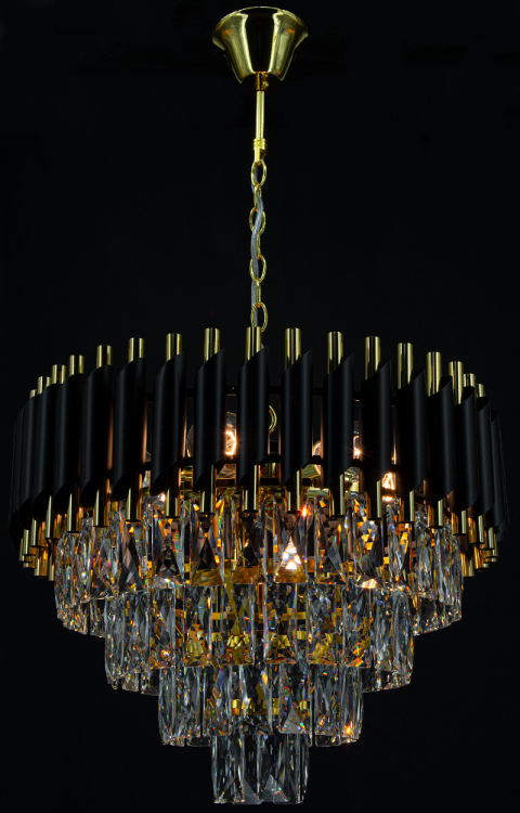 Stylowy żyrandol TOLEDO 6xE27 łączy matową czerń, złote detale i błyszczące kryształy. Idealny do nowoczesnych i eleganckich wnętrz — salonu, sypialni czy jadalni.