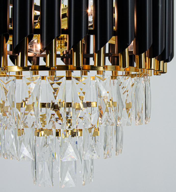 Elegancki żyrandol TOLEDO 4xE27 czarny złoty glamour z przezroczystymi kryształami rozświetli wnętrze, tworząc wyjątkowy klimat. Doskonały wybór dla miłośników luksusu i stylowych aranżacji.