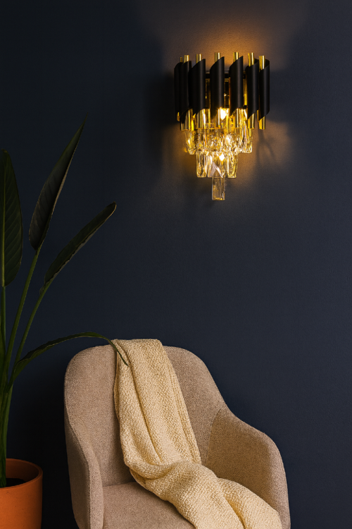 Kinkiet TOLEDO 1xE27 czarny złoty glamour to elegancka oprawa ścienna z przezroczystymi kryształami. Stylowe połączenie czerni i złota nadaje wnętrzu luksusowego charakteru i efektownego blasku. Idealny do sypialni, salonu i korytarza.
