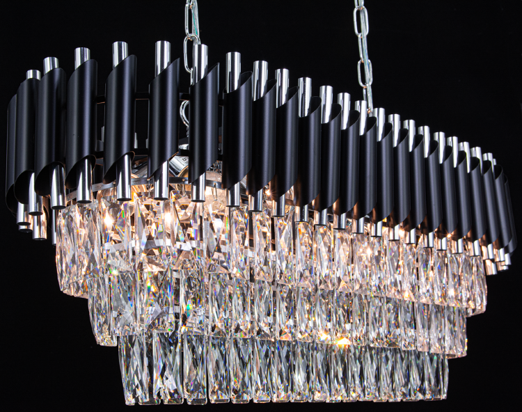 Lampa TOLEDO 8xE27 czarny chrom glamour to nowoczesne i eleganckie oświetlenie centralne. Osiem punktów świetlnych i kryształowe detale podkreślą prestiż Twojego wnętrza.