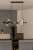 Lampa sufitowa GALAXY 7xE14 + 13W LED Ring czarna to elegancka propozycja w stylu nowoczesnym i loft. Czarne wykończenie z przezroczystymi kulami i wbudowanym LED tworzy wyjątkowy efekt świetlny w salonie lub jadalni